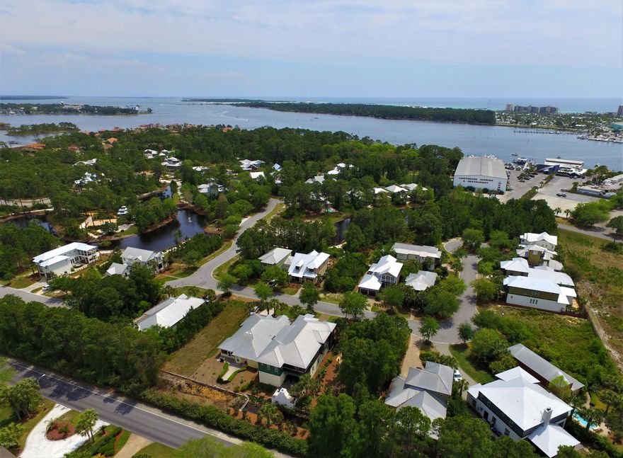 Martinique is a first class, gated waterfront community in Panama City Beach, featuring custom built homes with old-Florida style architecture! Each home is designed by an architect and custom built to suit your needs and last a lifetime! High building standards are implemented to ensure the quality & efficiency of your future home! Landscaping standards are designed to make the most of this extraordinary location!This lot is is approved for a single story home.