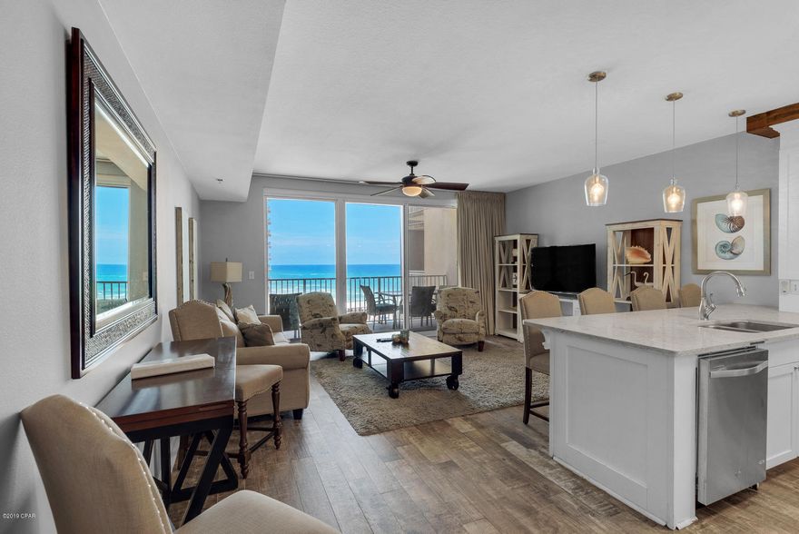 CURRENTLY UNDER CONTRACT, SELLER ACCEPTING BACKUP OFFERS. Shores of Panama 804 is a spectacular beach getaway located right on the beautiful white sandy beaches of Panama City Beach! Whether you are searching for a second home or that income producing investment, Shores of Panama 804 will be the perfect condo for you. As you walkthrough the front door you are immediately greeted with the beach themed decorations and superior cleanliness kept by the owner. This unit features beautiful tile flooring, stylish wood cabinets, quartz countertops, stainless steel appliances with a freestanding ice maker allowing you to serve those beach daiquiris throughout the entire day during your beach vacation. Both bedrooms are extremely spacious and feature beautiful on-suite bathrooms.