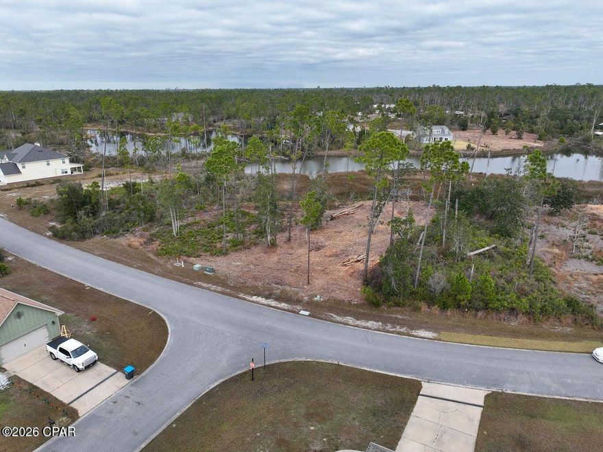 Build Your Dream Home in a Gated Waterfront Community!

Discover the perfect opportunity to create your coastal retreat on this recently cleared lot in the exclusive Laird Point community. This gated, waterfront neighborhood offers a serene and private atmosphere while providing convenient access to the water for boating and fishing enthusiasts.

Located just minutes from local restaurants, shops, and Tyndall Air Force Base, Laird Point combines tranquility with convenience. The neighborhood also offers dedicated RV and boat parking, making it ideal for those seeking an outdoor lifestyle.

This lot is in prime condition and ready for its new owner to build the home of their dreams. Don't miss out on this chance to own a piece of paradise on the bay!