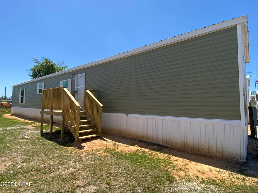 NEW HOMES IN COTTAGE GROVE, LYNN HAVEN - just North of Baldwin Ave and near Haney Technical College and Mosley High School - all new 3bd, 2ba 1,200sqft mobile home, LVP flooring, stainless appliances, large pantry, Mbed walk-in closet, Mbath double vanity. W/D hookup. Landscaping included. Sorry no pets.