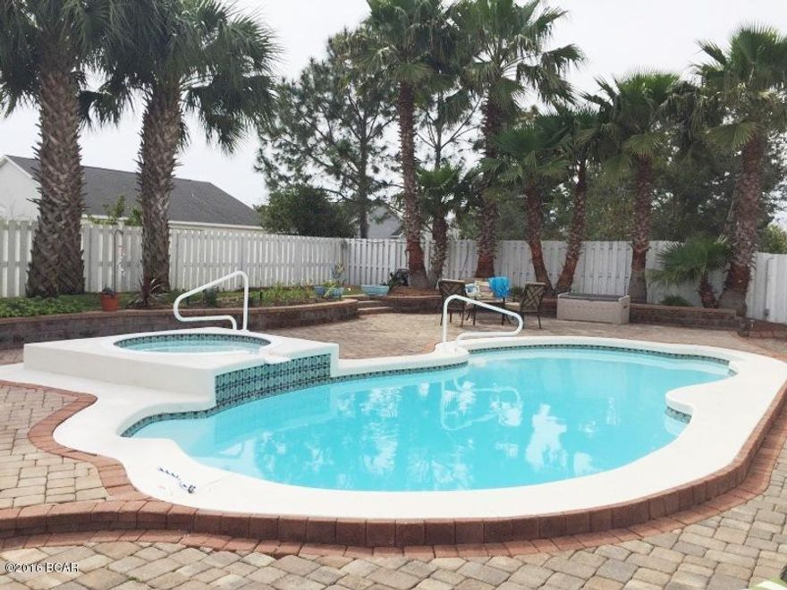 Sunday August 7th OPEN HOUSE, 1pm-3pm Nice location, close to restuarants, shopping, Frank Brown Sport Complex for bike riding, tennis, basketball, baseball, soccer, and walking trails. Not to mention the pier for fishing, and the beach for those beautiful days of sun & fun. This home in Palmetto Trace, has been upgraded in so many ways... lighting, appliances, granite counter tops, custom cabinetry, private saltwater filtration pool and whirlpool and waterfall, brick pavers, paint, all flooring is laminate or tile. back yard Very well maintained. Easy to show, call your and make your appointment today!