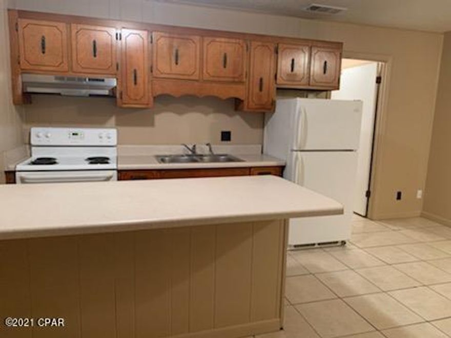 Quiet neighborhood with a one bedroom one bath middle unit that has been freshly painted. Convenient to TAFB and grocery stores. Garbage and Lawn care included with quarterly pest control. No pets. No washer or dryer hook ups at the unit