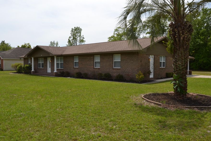LOCATION LOCATION LOCATION!! This renovated 4 bedroom, 3 bath home is located on a double corner lot in desirable Lynn Haven Florida.  If you need space and plenty of it, this property is for you!  The interior is very spacious with 4 bedrooms, 3 baths, a formal dining room, eat in kitchen and tons of inside storage.  The master bath is private with a separate entrance and HUGE master bath with garden tub and separate shower. There is also a super nice walk in closet.  The kitchen has solid wood cabinets, granite counter tops, tile back splash, stainless appliances and a breakfast bar. There is a breakfast area just off the kitchen and attached to the formal dining room.  The living room has access to the screened covered patio. Three bedrooms and 2 more baths are separate from the master. A two car carport (that could easily be converted to a garage) is attached to the home and there is wheelchair access to the home also.  The lot measures 150x150 and has plenty of room to grow for a pool, separate garage or to be the neighborhood gathering place.   This home shows great and is ready to go!!! Call your Realtor today