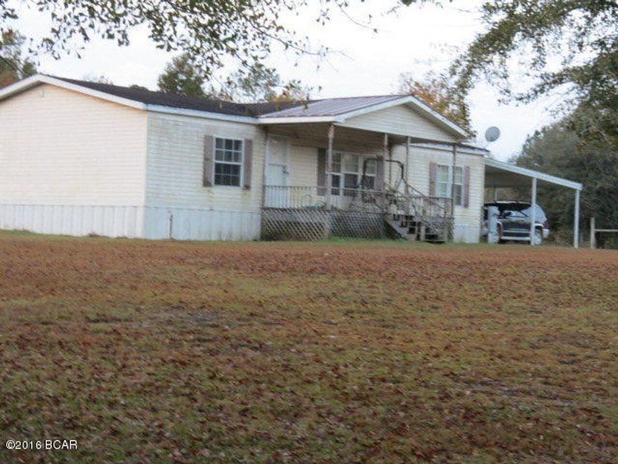 SPRING IS IN THE AIR! If you are looking for something to spread out you'll want to see this 3/2 DWHM. This home has a large living room a kitchen with lots of cabinets,nice size bedrooms with walk-in closets. There is a closed in back porch. All sitting on 2.2 ac. MAKE YOUR APPOINTMENT TODAY!!