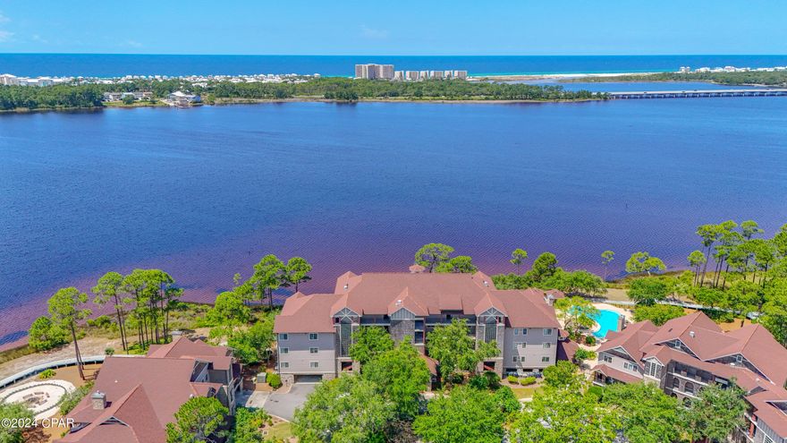 This stunning 3-bedroom, 3-bathroom waterfront condo in Wild Heron is a must see! The expansive views of Lake Powell are breathtaking from your second story balcony with a front row seat to the gorgeous Florida sunsets. You'll also enjoy additional amenities including a spacious chef's kitchen, luxurious master suite, and a balcony overlooking the wildlife, all offer an exceptional living experience. The community's offerings, like the boathouse, pool, tennis courts, and nature trails, truly enrich the outdoor lifestyle. And for golf enthusiasts, the Sharks Tooth Golf Club nearby is a fantastic addition. The open kitchen Provides you with plenty of space to prepare your favorite meals and finishes such as a gas, burning stove, stainless steel appliances, granite countertops, and a large walk-in pantry. 

The Waterfront, master suite Provides a large  walk-in closet, his and her vanities, A large tiled shower and a soaking tub. The two additional rooms provide plenty of comfortable living space and a full bath for each room. This unit showcases a luxurious and convenient lifestyle in a beautiful location! Call to schedule your private showing today.