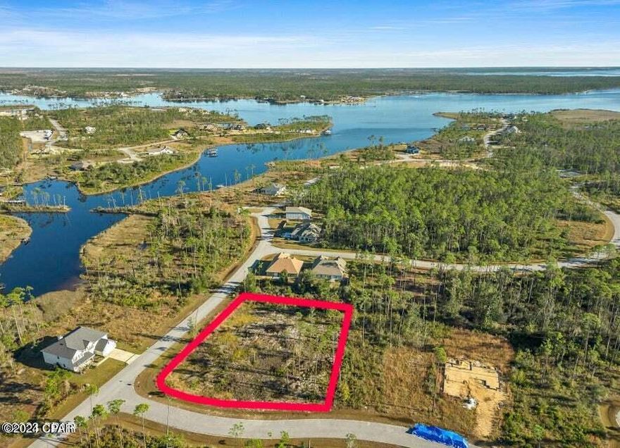 Motivated seller alert! Step into the enchanting community of Laird Point, where your dream home awaits. This exceptional lot offers stunning views of Laird Bayou and a serene lake, providing the perfect canvas for your ideal retreat. Nestled near Mexico Beach and Callaway, this location seamlessly combines tranquility with convenience.

Enjoy peaceful moments with foot or kayak access to the water, ideal for fishing or simply soaking in the serenity. With bustling communities nearby, vibrant energy is always close at hand. Thoughtfully improved and equipped with utilities ready for your dream home, this lot features a personalized floor plan tailored to your vision.

With two additional lots available, you have the option to expand your space or create your private sanctuary in this paradise. Craft your dream home with confidence, knowing that the essentials are already in place, allowing you to focus on bringing your vision to life.