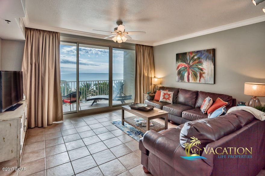 This is the PREMIUM floor in Shores of Panama.  Higher than the palm trees but low enough to drive and walk right over to your condo.  INCLUDES 5th FLOOR PARKING SPACE.  FULLY FURNISHED and REMODELED.   This is the floorplan that has the master bedroom and the living room both looking out over the pool to the Gulf.  It has a very large balcony.  Tile through-out, well cared for condo.  Make sure this one gets on your list. UPGRADED STAINLESS STEEL APPLIANCES.