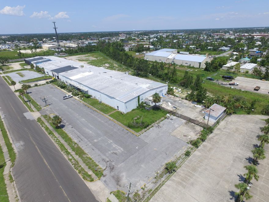 The former Bell Signs Building is available for lease. The 84,000 square foot building sits on +/-8 acres of land that could provide secure yard storage and rail-service if needed. 14,000 sq. ft. to 84,000 sq. ft.. Central Panama City location off W. 11th Street. The owners are completely renovating the building that includes: new roof, new purlins, new metal siding, new gutters & downspouts, new roll-up doors. Completion Spring '21. 20' Eave-height. 4 dock-height loading doors and numerous oversized street-level loading doors. Fully-sprinklered. 3-Phase, 200 to 600 Amp Service. Call with any questions and to setup a tour.