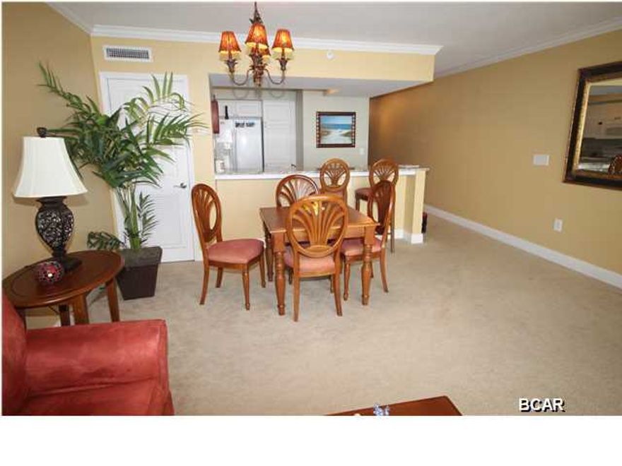 Great views from this 13th floor unit. Kitchen features granite counter tops, GE Profile appliances. Amenities include swimming pools; hot tubs; tiki bars; StarBuck's coffee shop; a fitness center/spa and 8 high speed elevators. Individual unit amenities are indicated to include 3cm granite kitchen countertop and splash, breakfast bar, crown molding, cultured marble tubs and surrounds, GE Profile appliances, full size stack washer and dryer, tiled wet areas, a private balcony showcasing beautiful gardens and breathtaking surroundings, covered parking spaces, and oversized sliding glass doors overlooking the Gulf. All information is believed to be correct but should be verified by the buyer.