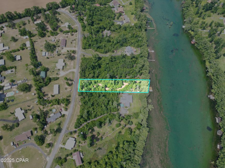 WATERFRONT LOT on MERRITTS MILL POND!!  A rare opportunity to buy on this 4-mile-long spring fed lake.   Starting at a First-Magnitude Spring known locally as Blue Springs and worldwide as Jackson Blue this waterway is home to the former world record shellcracker fish (currently the State record), excellent swimming, boating and kayaking opportunities.    Build the home of your dreams or just build a dock and enjoy all of what nature has to offer.  Several other springs adorn this waterway.    Call today for your appointment.