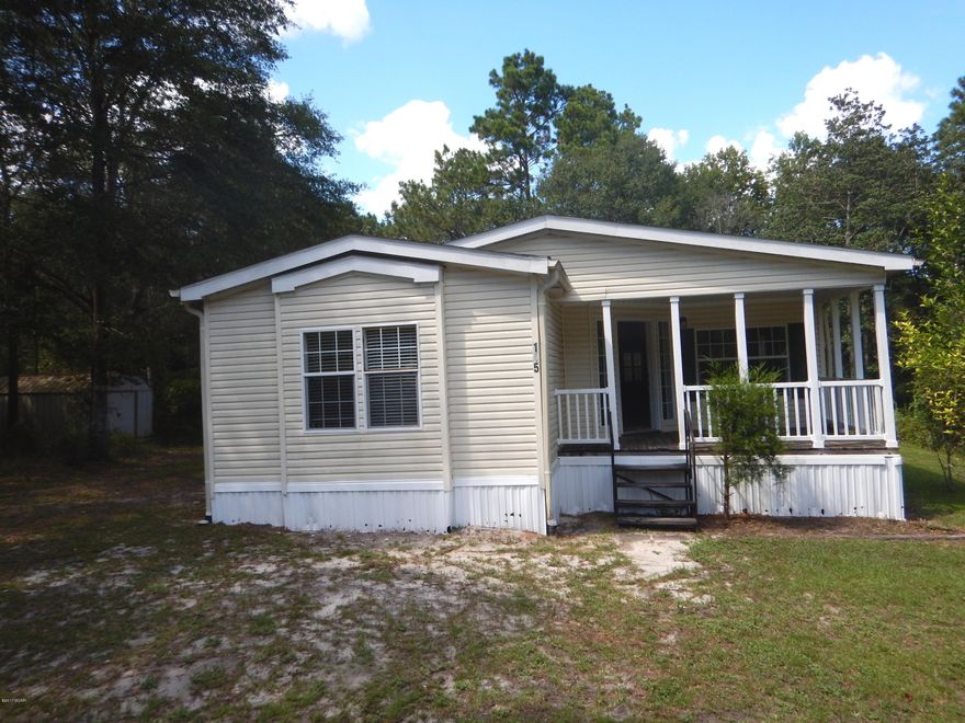 Handyman Special 3/2 oversized mobile home situated on 1 acre of serenity. This charming and spacious home offers a split bedroom floor plan with larger sized bedrooms, a large eat-in kitchen, and a living room with a fireplace and built in bookcases. The lot is just as beautiful as the home itself! All Information recorded in the MLS is intended to be accurate but cannot be guaranteed, buyer advised to verify. Sold As-Is. No utilities will be turned on to this property and only cash/renovation loan offers with 0 day inspection period will be considered. Buyer should perform their due diligence/necessary inspections before submitting an offer.