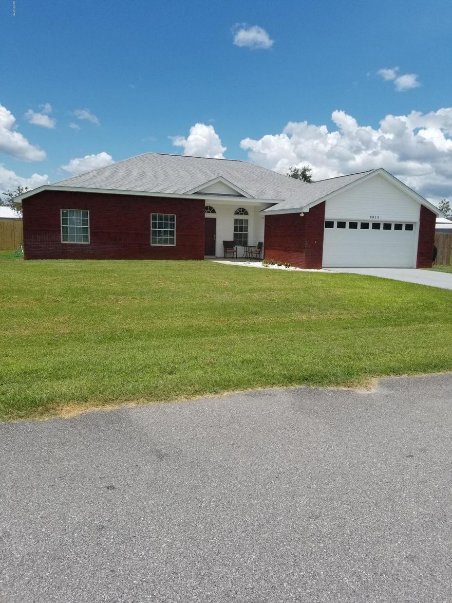 Beautiful home away from all the traffic.  Over 1/2 Acre Yard. All new Stainless Steel kitchen appliances, new water heater, new roof and New A/C.  New fence surrounding huge back yard.  New flooring whole house in this great 4 bedroom and 2 bathrooms.  Great Screened Porch off den. Sellers are giving a free 1 year Home Warranty with purchase...  Make an appointment to see today.  PLEASE VERIFY ALL MEASUREMENTS AND INFORMATION.  $10,000 Price Reduction.  Make Appointment Today...