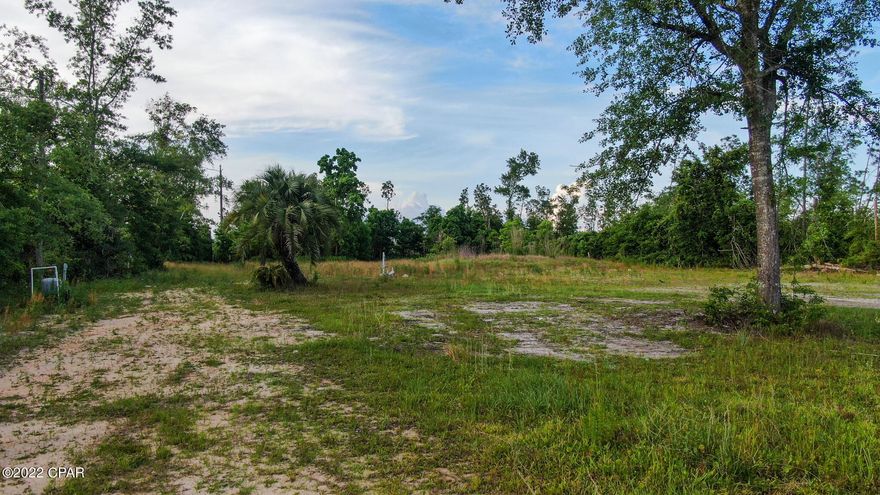 Great building lot in Youngstown!  Completely cleared with well, septic, and power. Perfect place for a site built home, modular home, or mobile home. County maintained road! Located just minutes from Panama City, shopping, dining, and the beaches of Panama City Beach.  All measurements are approximate, verify if important.