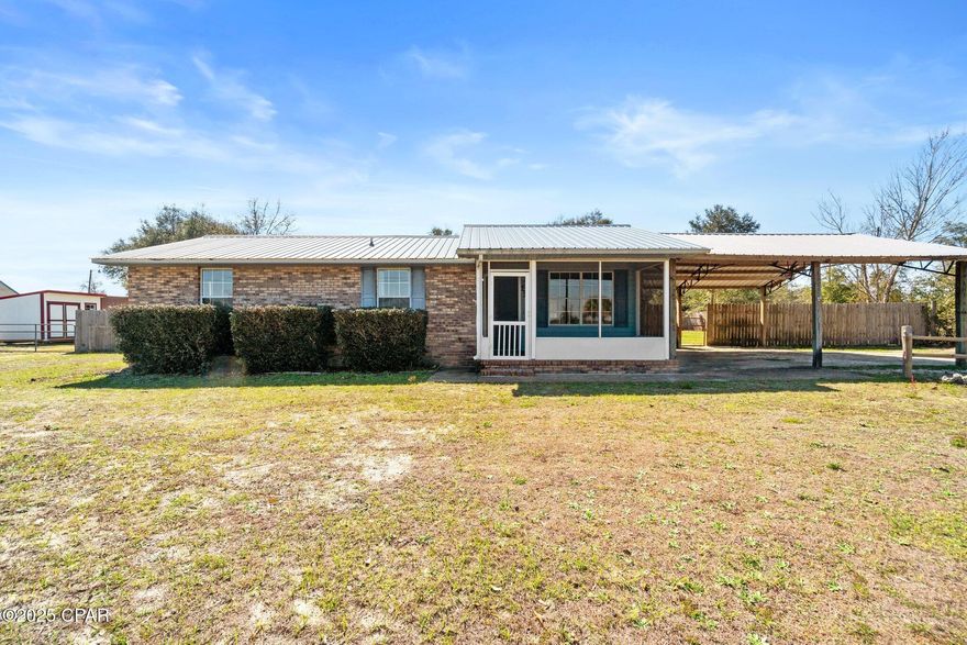 New to the market! The pride in ownership really shows throughout! This 3 bed 1 1/2 bath brick home is in a quiet neighborhood. The front of the home features a lovely screened-in front porch, a perfect spot for relaxing and enjoying your cup of coffee.  Enter into a nice living space featuring luxury vinyl plank and plenty of natural light. The kitchen features real wooden cabinets with plenty of storage. Nice sized laundry room with cabinets.  Head outside to the covered back patio, a great space for entertaining family and friends. A spacious backyard with plenty of room to play. 2 sheds for additional storage. This home sits on a half-acre lot. The location is perfect, only 30 min to Tyndall Air force Base, 35 min to new airport and 45 min to Pier Park and Beaches.