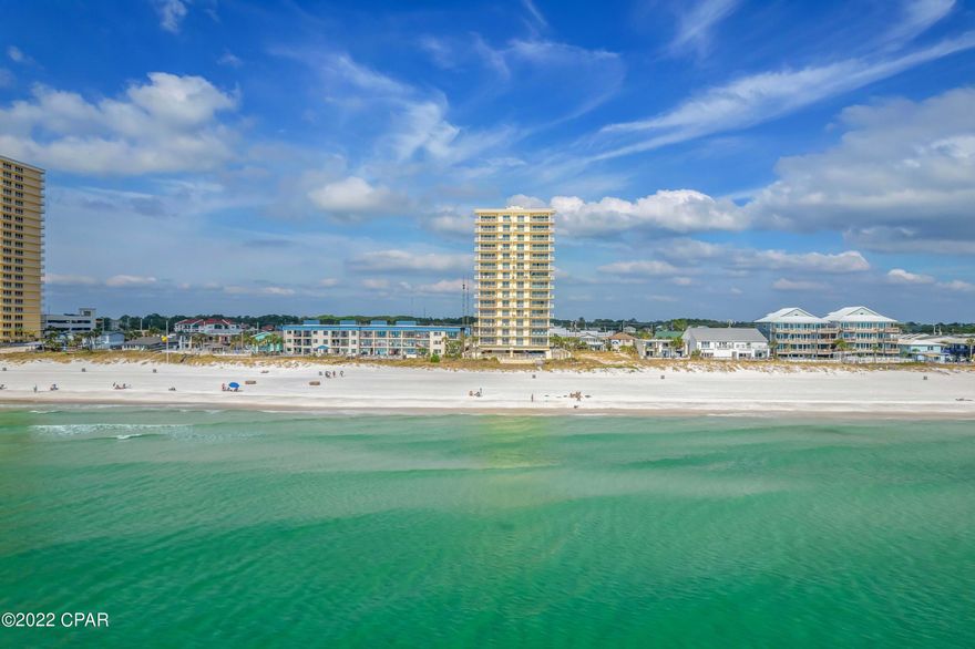 This is your opportunity to own a GULF FRONT condo on the 4th floor of a GATED complex on the beautiful Panama City Beaches.  With only 14 floors and 2 units on each floor, you will enjoy the peace and quiet while watching the waves crash on the beach. You will also see the gorgeous views of the ''sun dropping into the ocean'' at SUNSET!  The Master Bedroom is waterfront and separated from the other ''sleeping'' rooms.  It has a large attached bathroom with a tub, shower, and double vanities with sinks ---as well as a separate toilet area.  The main Living Room has plenty of room with shelves on one wall and a separate dining area- The kitchen has a large pantry and a breakfast bar with plenty of extra room for a table and chairs. If you want a very nice home or investment, this is it!