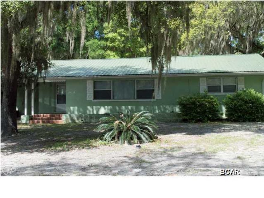 This 2 bedroom 1 bath home features a spacious kitchen, dining area and large living room. Hardwood floors are in the bedrooms as well as cedar lined closets.bThe exterior offers a large fenced in back yard, detached garage (which can be accessed from an alley) or workshop and a carport.