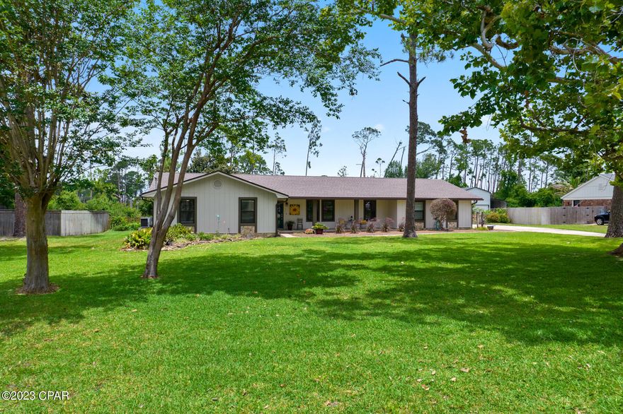 **CURRENTLY UNDER CONTRACT, SELLER WILL CONSIDER BACKUP OFFERS**Beautiful 4 bedroom/2.5 bathroom home in desirable (and quiet) Kingspoint! This stunning home, which sits tucked away on a cul-de-sac, has been renovated from top to bottom. The curb appeal of this home can't be beat, featuring huge trees, a lush green lawn, well-kept landscaping, and a front porch that spans nearly the entire front of the home! Exterior improvements to this classic ranch home include a new roof (2018), all new windows and doors (2020), new water heater (2018), privately owned water softener (2019), new porch screens (2020), new storage shed roof and siding (2020), and paint (2020). Interior improvements include a new high efficiency HVAC system (including ductwork throughout, 2020), recessed lighting (2020), paint (2020), LVP flooring throughout (2020), remote controlled ceiling fans, full master bath remodel (2020), and a full kitchen remodel (2021). This light and airy home has two living spaces--a formal dining room that includes a cozy sitting area at the front of the home, and an open concept kitchen/family room with beamed vaulted ceilings and a decorative stone fireplace! The fully remodeled kitchen boasts custom soft-close cabinetry, quartz countertops, stainless steel appliances, a coffee bar, glass floating range hood, a breakfast nook with a bay window overlooking the pool, and much more! The large laundry room, which is plumbed for a soaker sink, has plenty of storage, extra space for a deep freeze or mudroom bench, and a lovely half bath. The tranquil master bedroom has a large walk-in closet, and french doors leading out to the screened porch. Enjoy the phenomenal Florida weather year round in the oasis that is this home's backyard--complete with a massive screened porch,  large in-ground pool, an array of plants, and mature trees. This home has great storage space throughout, as well as a two car garage, newly built shed in the backyard, and extra parking in the driveway for a boat or camper. Great central location close to shopping, entertainment, restaurants, public boat ramps, Florida State University PC, Gulf Coast State College, and our beautiful Panama City Beaches! Don't let this Kingspoint beauty pass you by!