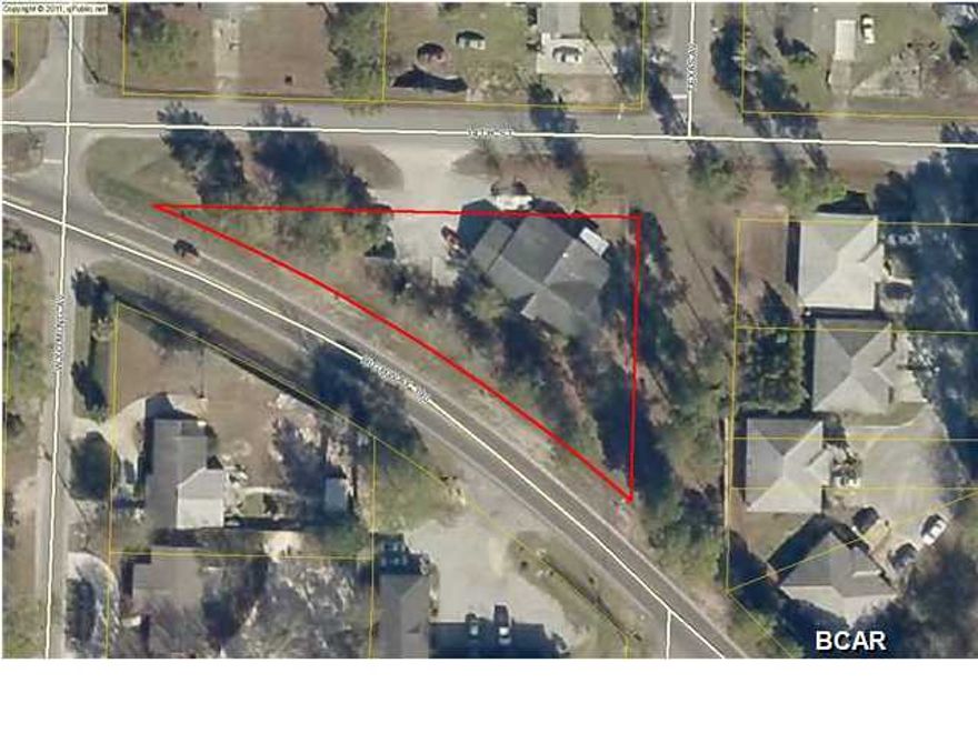 Free standing office building setup for two companies. FRONTAGE ON HWY 390 / Currently occupied by Allstate Insurance and David Morgan Homes. Enclosed storage area with additional fenced outside storage. Please do not disturb tenants.