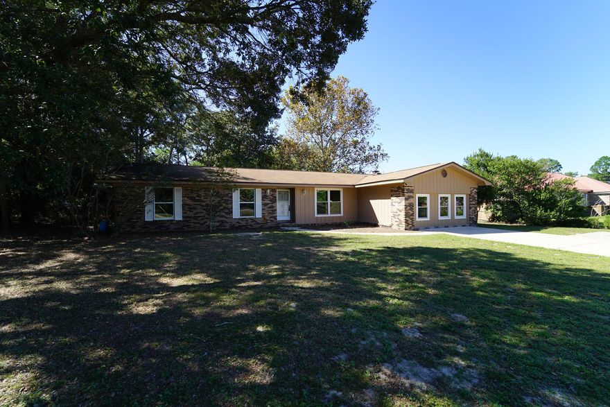 Room to grow! Full 5 bedroom home with a bonus space that could be used as an office. This home also features a formal dining room AND formal sitting room. New paint, flooring, granite, applainces and more. Move in ready! The large backyard features a large storage building. Owner will finance with $75,000 down.