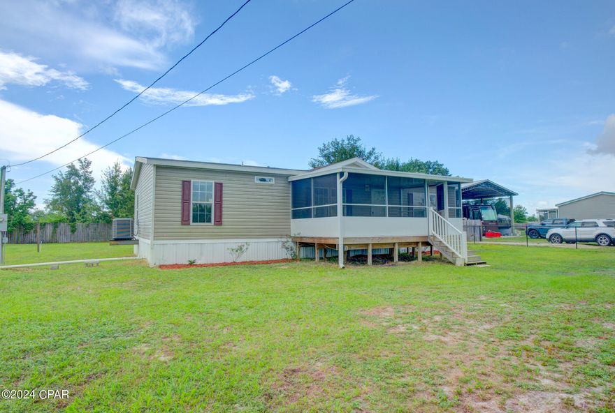 CURRENTLY UNDER CONTRACT, SELLER WILL CONSIDER BACKUP OFFERS. Motivated Sellers...Welcome to 7208 Pittsburgh Street in the vibrant city of Panama City, Florida. Situated on fully fenced .488-acre lot in Panama City, this property benefits from its convenient location, with easy access to local amenities, schools, and employment opportunities (Tyndall AFB). This mobile home offers 3 bedrooms and 2 bathrooms, providing ample space for residents. As you step inside, you'll find a spacious open concept living and dining area, perfect for gatherings. The nice size master bedroom and large bathroom on one side of the home. On the other side of the home, you'll discover two roomy spare bedrooms, ideal for family or guests, and they share a well-maintained hall bathroom. Outside, you'll love the covered front porch - perfect spot for relaxing and enjoying the outdoors.