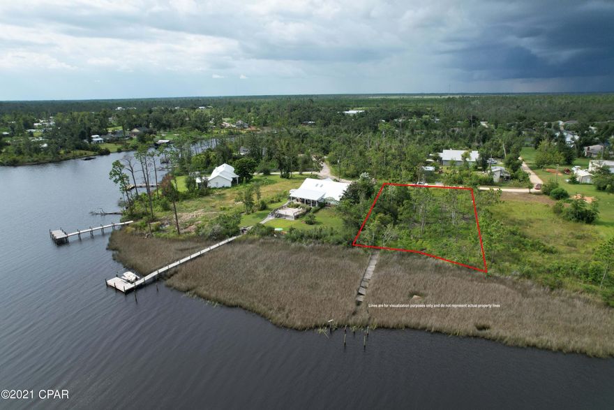 Build your dream home with your dream large waterfront lot with access to the Gulf of Mexico. The pilings for the are 110 foot dock are installed, so all you will need is to put down boards to complete your dock. The water is an estuary giving you the widest verity of seafood steps away from your back porch. Located in the quiet community of East Bay, enjoy the natural surroundings of Florida without having to compromise the convenience of shopping, restaurants, schools, and services, all located just a short 10-minute drive from your quiet waterfront lot. A small marina and restaurant is located very close by if you wanted to stay closer to home. Don't wait to start your plans on your forever home start by purchasing your waterfront lot before someone else does.