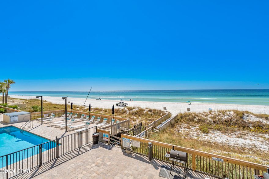 CURRENTLY UNDER CONTRACT, SELLER WILL CONSIDER BACKUP OFFERS. Invest in your future at Whispering Seas 206, an exceptional, updated condo that has consistently generated IMPRESSIVE rental income. This Gulf-front 2bd/2ba unit boasts a PROVEN track record; earning $46k in 2024, $38k in 2023 (lower due to owner usage), and $48k in 2022. Comfortably sleeping 8 guests, the condo features a king bed in the primary bedroom with STUNNING Gulf views, a queen bed plus bunk bed in the guest bedroom, and a sleeper sofa in the living room. With renovated kitchen and baths, in-unit washer/dryer, and stylish coastal decor, Whispering Seas 206 comes fully rental-ready and the option to keep it on the same rental program for easy transition. The well-equipped kitchen allows residents and guests to prepare meals with ease, the open living area provides ample seating, and the Gulf-front balcony offers the perfect spot for morning coffee or evening relaxation. Recent upgrades to the unit include a newer HVAC and water heater, hurricane glass sliding doors being installed, and refreshed furnishings throughout.
The complex itself has also seen recent upgrades and improvements to the Gulf-front pool, grilling gazebo, parking lot, and building exterior. With the Condominium Milestone Report done, Structural Integrity Reserve Study completed, reasonable HOA fees, and no pending assessments, this turnkey property offers peace of mind for residents and investors alike. Situated in a low-rise complex with only 30 units, Whispering Seas 206 offers a more calm, serene beach experience. The proximity and ease of getting from the parking lot to the condo to the beach itself is rare. Additionally, its prime location puts you within minutes to a plethora of shopping, dining, and entertainment options in East PCB, including a nearby Walmart for convenient essentials. Pier Park is less than 7 miles west and St Andrews State Park is less than 4 miles east. 
Don't miss this opportunity to own a piece of Panama City Beach paradise. Whether you're looking for a vacation home or a lucrative investment, Whispering Seas 206 delivers the perfect blend of comfort, style, and rental potential. Schedule your private showing today and start enjoying the beach life you've always dreamed of!