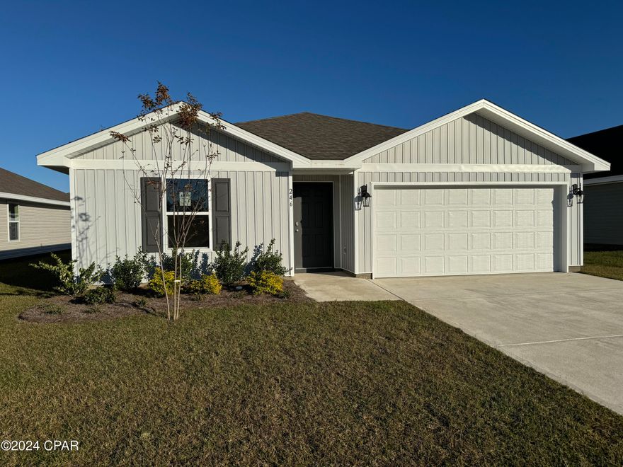 Park Place is a new construction neighborhood in Panama City, Florida. The Freeport is a single-story home with a double garage designed with space for the family in mind and affordability. This home is located on Lot 22 at 246 Lawton Branch Way. As you walk up to this home, you will see vinyl siding on all sides as well as, dimensional shingles and a landscaped yard complete with flowerbed at the front entry. As you enter this 4 bedroom, 2 bath home, you will see 1,387 square feet of spacious, comfortable living. Inside you will see 8' ceilings throughout, engineered vinyl plank flooring throughout the home and carpet in the bedrooms. quartz countertops, white cabinetry and a spacious open living room and kitchen make this home perfect for having guests over. The kitchen has a center island that is perfect for serving kids or guests, a nice size pantry and the stainless-steel appliances include smooth top range, microwave, and dishwasher. Located right next to the dining area, this makes serving meals with ease. The primary bedroom has a spacious bathroom and features a double vanity with granite countertops. A walk-in closet with ventilated shelving is also located in the bathroom, giving you more room in the primary bedroom. The guest bathroom features a single vanity with quartz countertops and a shower. Park Place is Less than 10 miles to Tyndall Air Force Base, making it our closest neighborhood to the base. It is located only 18 miles to the beautiful white sand beaches of Panama City Beach and 10 miles to the business and shopping district of Panama City, 23rd Street and Historical Panama City. Park Place is close to great schools in the area and only 23 miles from the quiet, well visited Mexico Beach, Florida.