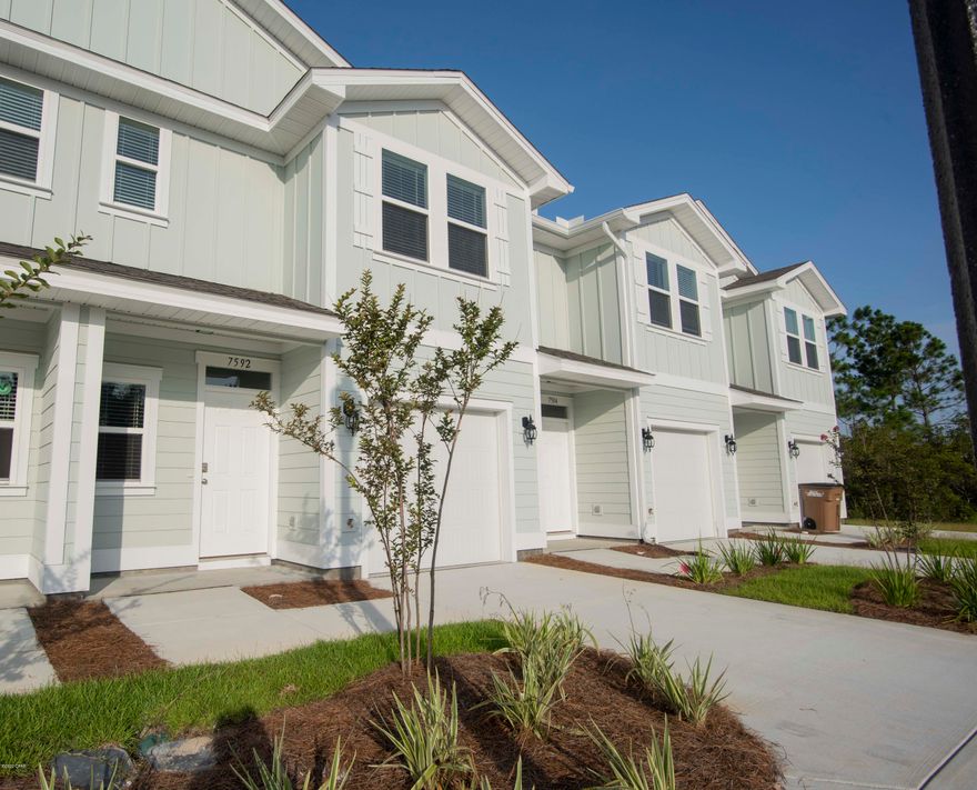 3 bedroom, 2 1/2 bath townhome in Hathaway Townhomes. This unit is brand new and never lived in.  Downstairs the home features a nice size kitchen with stainless steel appliances, granite counter tops, pantry, & breakfast bar.  Living area downstairs is spacious & there's room for plenty of furniture & a dining room table. You'll appreciate the half bath for your guests. Upstairs you'll find three nice size bedrooms, new washer and dryer, extra storage closets and a full bathroom. The master is enormous & boats a relaxing en suite bathroom with a shower & double sink vanity.  You'll love the walk in closet! Outside features a wood deck that backs up to a quiet preserve. This townhome is also steps away from the community pool featuring waterfalls, handicap access, & bathrooms.