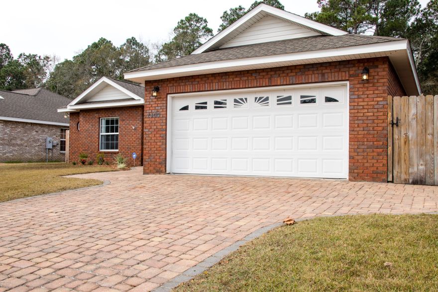 Proud! That's how you will feel owning this young 2005 all brick 4 bedrooms and 2 full baths 2,096 SQ FT home. High ceilings, crown moldings, great open floor plan, fireplace... A very desirable, family oriented neighborhood with sidewalks. A 2 car garage with pavers driveway and side walk. Near everything and only 24 minutes to Air Force Base or Navy Base in Panama City Beach FL. No back yard neighbors! Just lush greenery and a privacy fence to keep your kids and pet safe. A covered patio for your BBQ nights. Enough space in the backyard for a pool and more!  It is truly a rare find. Just come and see it !