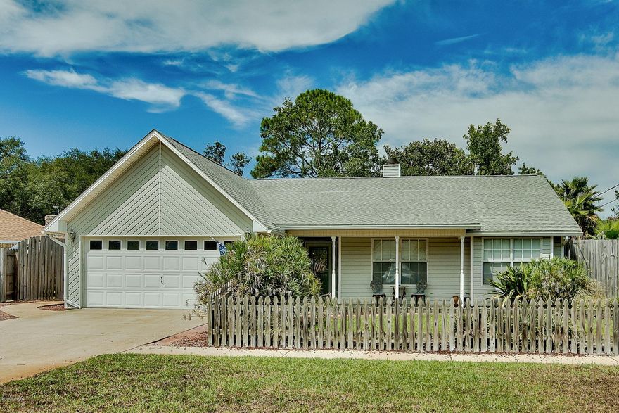 THIS FRESHLY PAINTED HOME FEATURES A SPLIT BEDROOM FLOOR PLAN, VAULTED CEILING IN THE ENTRY & LIVING ROOM, MARBLE VANITIES, PLENTY OF CABINETS, BREAKFAST NOOK THAT MAKES A GREAT OFFICE, FORMAL DINING AREA, WINDOW SEAT W/STORAGE, WOOD BURNING FIREPLACE, WALK IN CLOSET, LARGE DECK IN BACK W/EXTENDABLE AWNING, PRIVACY FENCE, SPRINKLER SYSTEM ON TIMER, LAWN PUMP, 2 CAR GARAGE W/AUTOMATIC OPENER, AND LARGE YARD WITH LUSH, MATURE LANDSCAPING. HOME IS IN IMMACULATE SHAPE