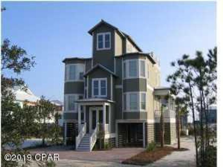 Entered as a comp...This home is located across the street from the public beach access at Allen Loop. The amazing Gulf views, five bedrooms and heated pool make this the perfect vacation home. The two garage has enough room to park four vehicles and a drive way that will accommodate four more. The first floor consist of two guest rooms, a full bath, the laundry room and Master bedroom. The Kitchen is on the second floor, stainless appliances and granite counter tops. The third floor consist of a guest room, bathroom and a porch with the best views in the house. Hardwood floors throughout the entire home and more improvements than can be listed. Contents convey with a few exceptions.