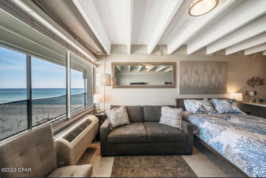 Looking for an upgraded Gulf-front studio with breathtaking easterly views of pristine white sandy beaches and emerald waters? The interior is a complete overhaul featuring new flooring, new bathroom, a stylishly revamped kitchen, and fresh paint throughout. Comes fully furnished and turnkey rental ready with a brand-new AC installed in April 2023. Located in proximity to attractions, shopping, and Pier Park, it ensures a delightful array of activities for you and your family. Short-term rentals are permitted, and the beachfront pool invites you to unwind in style. Seize the opportunity to indulge in coastal charm and tranquility.
Buyers agent/buyer to confirm all items of importance.