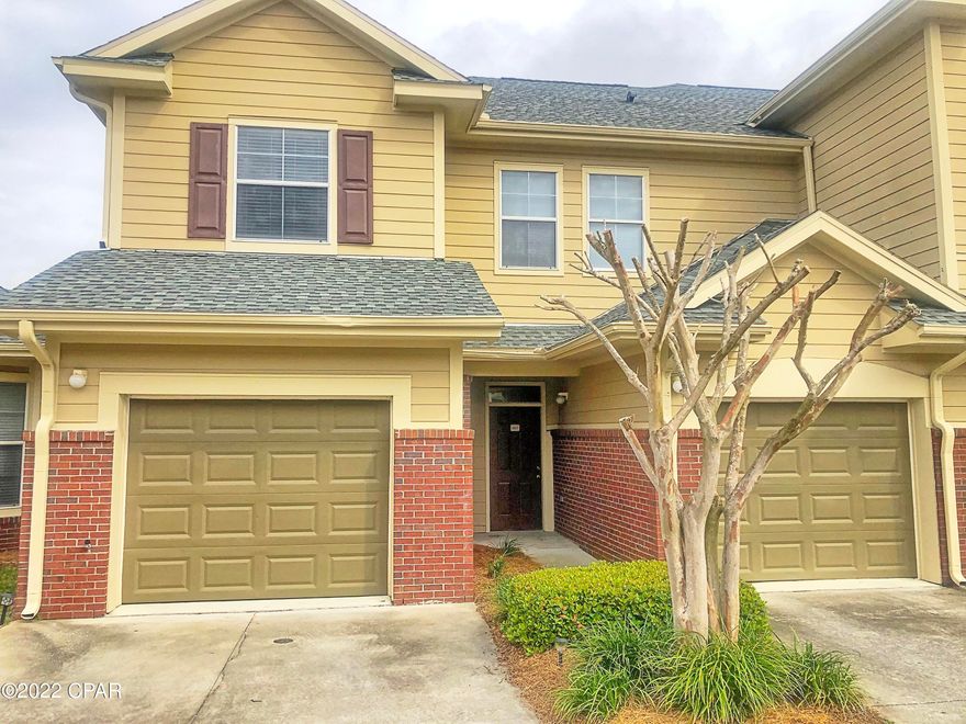 Lakefront Town-home With a Picturesque View in a Beautiful gated community centrally located to Bay County's Top Schools, shopping and restaurants. Courtesy officer lives on premises. Community pool. Roof is 3 years old