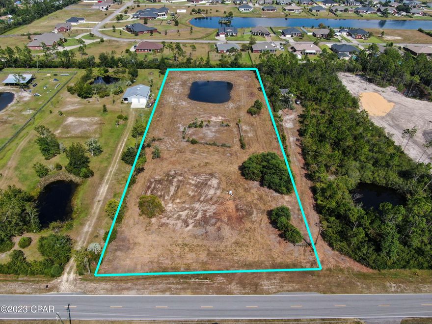 Under Contract - Taking Backups Here's your chance to build your custom dream home on almost 3 acres with NO HOA! This property was recently bush hogged and has a pond.