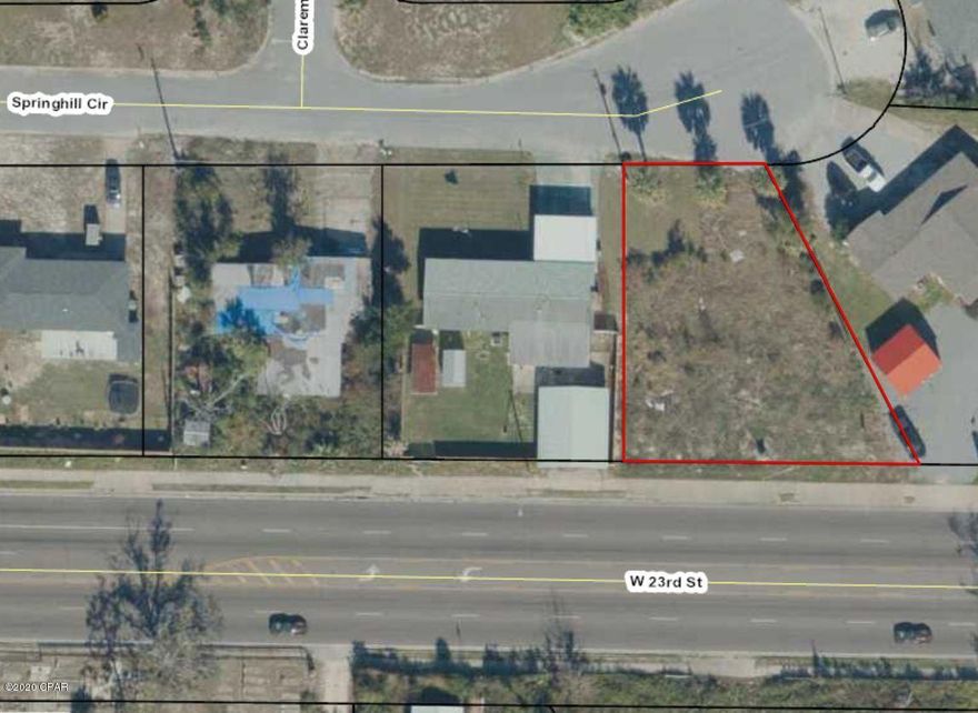 PRIME SPOT ON BUSY 23RD ST! Zoning- General Commercial 2. This also allows usage under General Commercial 1. More info in documents section of listing. 117' of Frontage on 23rd st and additional access via Springhill Circle (cul de sac) at rear. Near Banks, Hospitals, Professional Offices, and more. Booming area of town! Excellent Visibility with additional access. Build your office here! Demo of structure in 2016, some utilities remain. Sold As-Is. Buyer to confirm all aspects of lot size, function, improvements, and general use. Zoning Info Available in Documents Tab.