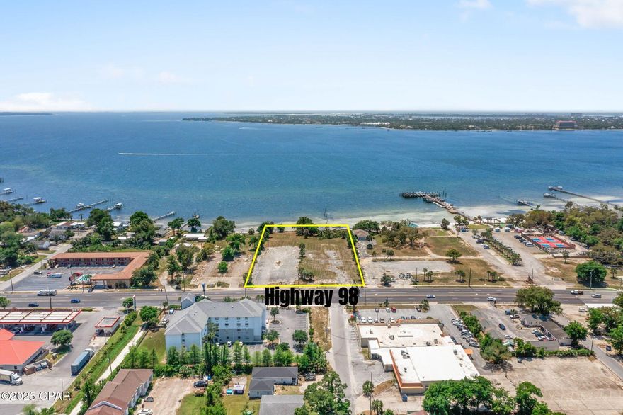 Exceptional opportunity to acquire 4.21± acres of prime commercial waterfront property, strategically located in Panama City. Zoned General Commercial, this site supports a broad array of development opportunities such as retail centers, professional office complexes, service businesses, wholesale sales, shopping plazas, and more. The zoning is designed to accommodate intensive commercial activity, making it ideal for developers or investors seeking a high-potential waterfront site in a growing market. Boasting a 2024 FDOT Average Daily Traffic Count of 41,500, this high-visibility site offers unparalleled access and exposure for a wide range of commercial ventures. Situated close to major regional landmarks including Hathaway Bridge, the Port of Panama City, Gulf Coast State College, and Florida State University's Panama City campus, this property sits at the crossroads of commerce, education, and infrastructure. Don't miss this rare opportunity to develop a high-impact commercial property in one of Panama City's most accessible and dynamic locations.