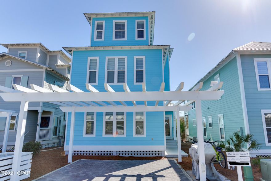 SEACREST BEACH HOME – ''The Sassy Seagull'' on 30A, located in the community of Cottages at Camp Creek! This FRONT ROW 5 Bedroom / 4 Bathroom home is directly across the street from the gorgeous white sand beach offering Breath Taking Views!!! And to top it off....Camp Creek's DEEDED BEACH ACCESS is just a short stroll across the street!!! This Home has a Great rental track record with many repeat renters. Home features (2) Master Bedroom Suites on the first floor, with (1) large bedroom on the second floor that has two queen beds and (2) additional Bedrooms on the third floor with bunk beds and room for the kids to hang. Upgrades include shiplap accented walls on the first and second floors, refinished hardwood flooring, new handrails and banister railings, upgraded cabinets and drawers in the kitchen and all bathrooms along with new Moen faucets, new fans and light fixtures throughout. There are also New smart TVs in the Living Room (70") and in the 5th Bedroom on the third floor. New washer & dryer and microwave installed this year and LG range in 2017. Additional features of this fabulous home and community are; four Taxi Beach cruiser bikes for you or guest to cruise along the trails throughout Seacrest, Tommy Bahama beach umbrella and chairs, nearby 12,000sf lagoon pool and easy access to all the nearby shops and restaurants. Don't miss your opportunity to own this FABULOUS beach property!!!! All dimensions are approximate and should be verified in important.