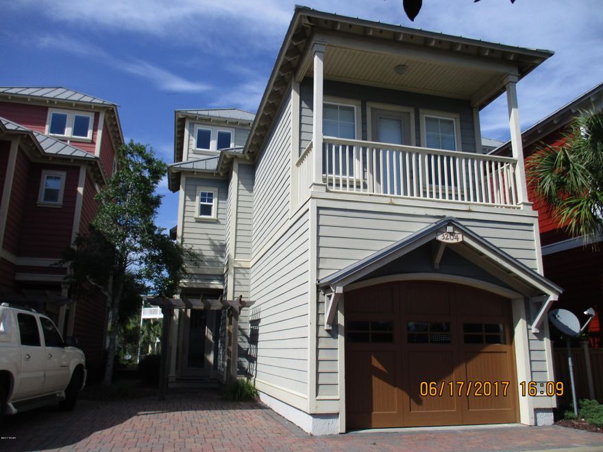 Coastal living in beautiful Mexico Beach. A gated community with a pool and canal and gulf view. This unit is at a perfect location with access to the nicely landscaped common area and sun deck  overlooking the canal. Enter into a tastefully decorated condo featuring a fully equipped kitchen with granite counters, tile flooring, breakfast bar and open to the dining and living room, half bath off the kitchen. Continuing outside to a covered porch. Second floor has the  master bedroom and bath with a balcony overlooking the canal. Two guest bedrooms share a full bath, front bedroom with a balcony overlooks the gulf side, continuing to the third floor is a private fourth bedroom with a gulf view and canal view.  What a great place to live or have as a second home.  This is a Lender Approved Short Sale.  Price is Set.