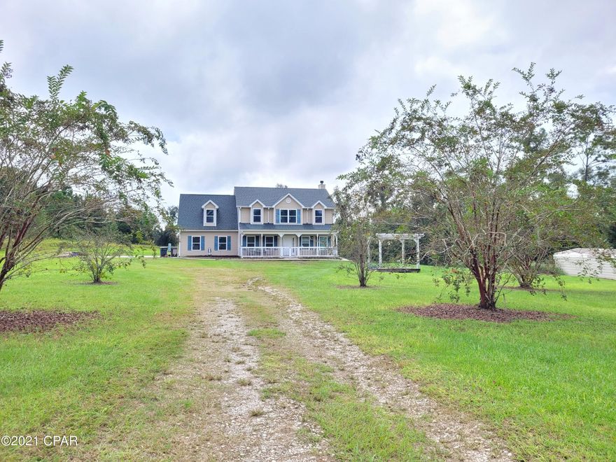 **CURRENTLY UNDER CONTRACT. SELLER IS ACCEPTING BACK UP OFFERS** Looking for a large home for your family?? Well STOP and look no further than this 4 acre country home. 4 Bedrooms, 2 1/2 bath home with office that can be used as a 5th bedroom! All Bedrooms are located on the 2nd floor with newer wood flooring in all rooms. Master bath has his/her closets, separate shower, and garden tub! The first floor has a open living area to the kitchen with center island. Newer appliances with double oven, 4 door refrigerator, dishwasher & microwave oven.  Formal Dining room, laundry area and pantry. 2 car attached garage. The backyard has a 28x22 covered porch just waiting for you to host a party with a Built in bench. There is also a 8x15 screen porch plus an 8x15 open deck area. The home has a new roof, all new nuclear windows which can withstand 160mph winds. ADT Alarm system, 2 HVAC systems, garage door opener. This house will NOT last long so call today for your private showing!!