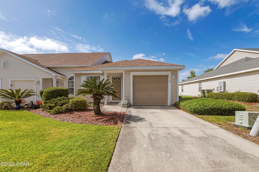 Located in the sought-after Hammocks community in Lynn Haven, this home offers both comfort and convenience. The scenic neighborhood is ideally situated near shopping, entertainment, and highly rated schools. Residents enjoy community ground keeping and access to a pool.

The home features a one-car garage and added privacy with no neighbor to the right and only one shared wall. The primary bedroom includes double closets and a private en suite bath. A new roof was installed in 2018. Step outside to a nice back patio, perfect for relaxing or enjoying outdoor time.