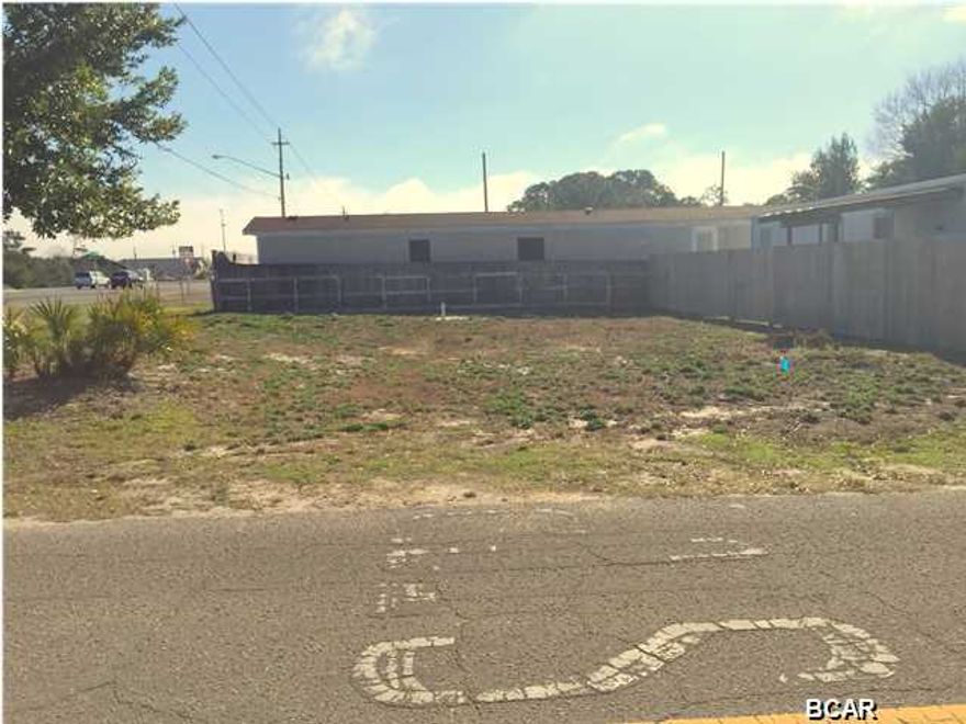 Corner lot in Laguna Beach area, on the south side of Panama City Beach Pkwy, and Placido Place. There is a septic tank, buyer will need to inspect for accurate/current condition. Currently zoned as Residential (R-2 Zoning). The street goes through to Front Beach Rd to Dedicated Beach, and there are speed bumps in place on Placido Pl for safety of golf carts, or walkers, etc. Seller says sell this lot!  So bring your offer today.