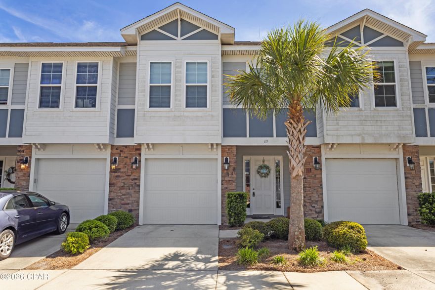 Great price on a beach getaway or primary residence. Located just a bike ride away  from white sand beaches (1.3 miles). Just minutes from Pier Park. Lots of uprades in this spacious townhome close to beach and shopping. This spacious 3 bedroom townhome in the heart of Panama City beach is situated on a small pond for backyard privacy. This unit features uprgaded custom pantry and walk in closet in master bedroom, a hot tub on back patio, huge master with custom walk in shower, attached garage and lots of storage. Low HOA fees that include lagoon style pool and club house and all of the grounds maintenance.  Additional parking close to unit. This is a must see in this price range.