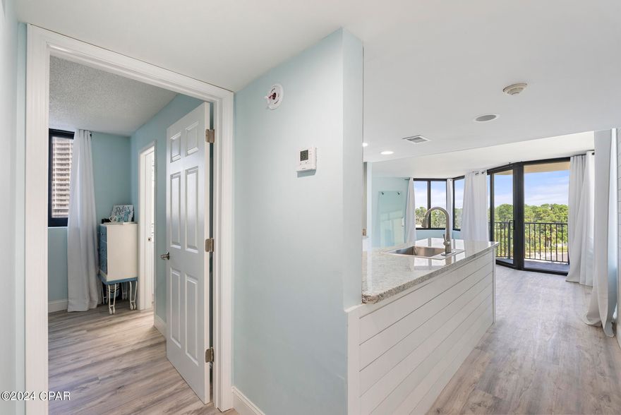 ***WOW...LEAST EXPENSIVE CONDO ON THE MARKET AS OF LIST DATE!!!*** 1bd, 1ba completely renovated condo in the gated Sunbird complex. Sellers spared NO EXPENSE when renovating this beauty. Everything is new!! Updates and upgrades include(All 2023) cabinets and granite countertops, recessed kitchen lights, vinyl plank flooring and baseboards, shiplap panel entry wall, bathroom vanity/sink/mirror/lighting, completely painted interior. All 2024 upgrades: Refrigerator, stove, microwave and dishwasher, walk in shower, breaker panel with upgraded breakers and toilet. Complex has gone through an extensive renovation that includes all new windows, sliding glass doors, balcony rails, center pool, and EIFS(exterior insulation finish system...Google it). Sunbird amenities include 3 pools(one heated), community room and fitness center, tennis courts, and first floor laundry room. Centrally located right next to Pineapple Willie's, major shopping, and less than 10 minutes from Pier Park! Hurry before this beauty gets away. All information is approximate and should be verified by buyers if important