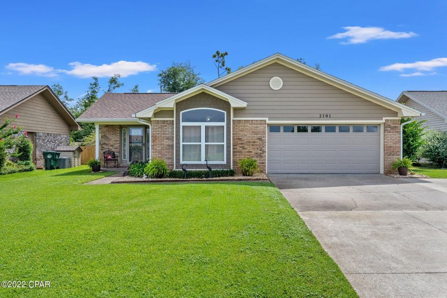 Check out this cozy Lynn Haven home, priced to sell fast!! Desirably located near schools, shopping & restaurants makes your day-to-day a breeze! This home features gorgeous hardwood floors throughout! The kitchen shows off timeless black granite countertops with a breakfast bar and island with stainless steel appliances. Spacious living room with an electric fireplace perfect for family night or quietly relaxing! The lawn is perfectly manicured in the front and back of home, with a screened back porch to comfortably enjoy & entertain! A large shed or worksop sits in corner of the back yard, customizable to best fit your needs! Call today to see this perfectly maintained home before its gone!