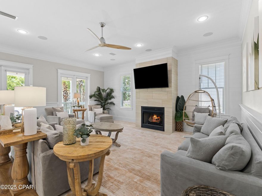 Fully furnished and rental-ready, this beautifully designed Capri floor plan in the golf cart-friendly community of Prominence South offers the perfect marriage of luxury and convenience. With four bedrooms, three-and-a-half bathrooms, and 2,378 square feet of elegant living space, this home is an established rental that promises comfort and style. Step into a spacious, open-concept living area that flows seamlessly into the dining space and a chef's kitchen with a breakfast bar for casual dining. The main-level master suite is a private retreat with an ensuite bathroom, while wood flooring throughout the home enhances its warm, inviting atmosphere. The second level includes two guest bedrooms  one with its own ensuite bath  plus a bunk room and an additional guest bath, all illuminated

by abundant natural light. Relax on your front or back patio, perfect for soaking in the coastal breeze. Residents of Prominence South enjoy access to an array of resort-style amenities, including a seasonally heated pool, a state-of-the-art fitness center, and a private shuttle service to the stunning beaches of 30A. The nearby town center, The Big Chill, offers a vibrant mix of restaurants, shops, an amphitheater and entertainment, making it a hub of activity. Plus, with three beach access points within a mile and 17 miles of scenic bike paths, adventure is always within reach. This exquisite home is a gateway to the ultimate beachside lifestyle, combining luxury living with unbeatable location and amenities.