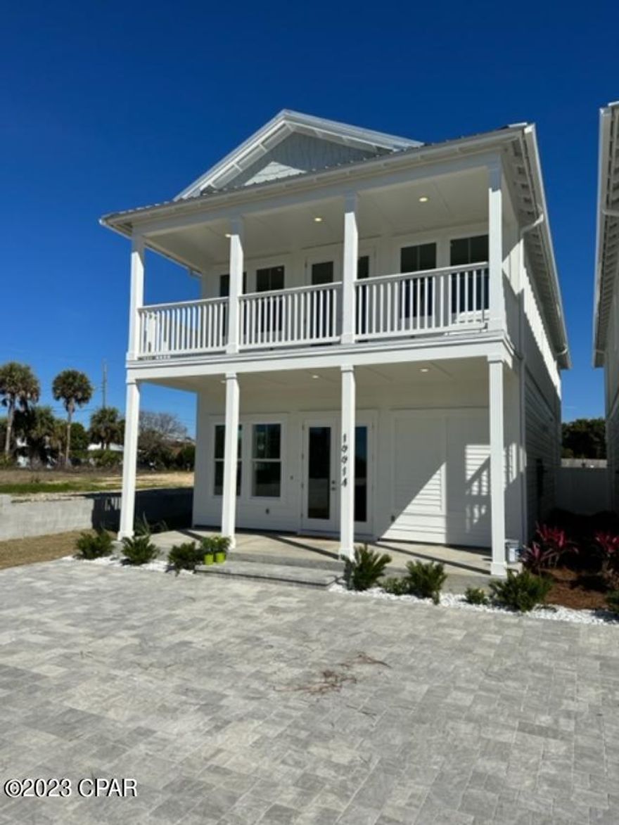 Newly Completed Construction on Coastal Luxury Home, directly on Front Beach Road.  Located on the West End of Panama City Beach in Laguna Beach. Great investment opportunity with projected annual rental earnings of $187,000 plus! This 5 bedroom, 4.5 bath, fully furnished home, has breathtaking views of the Gulf.   Features include a Chefs Kitchen with upgraded stainless appliance package including French door refrigerator, gas cooktop, dishwasher and wall oven/micro combo. Enjoy swimming in the Private, salt-water pool with gas pool heater. The home also boasts a gas tankless water heater, Hurricane, impact rated windows, Metal Roof, Hardie Siding, and 8' interior/exterior doors. There are master suites located on both levels, with an additional guest suite located on the second floo There are Master Suites On both levels. Just steps to the White Sands and Emerald Waters of Laguna Beach and only minutes from 30A