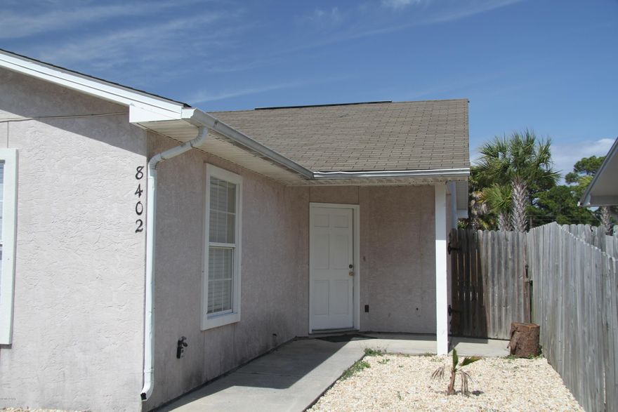 CLOSE to the beach! Great Location! This very clean and newly remodeled two bedroom, two bath, half duplex is ready to rent and did I tell you - you can walk to the beach! Brand new kitchen, granite, and stainless appliances. Bathrooms have also been remodeled with new vanities. The living area and both bedrooms are tiled. EASY to keep clean and tidy from the beach sand! Outdoor shower available, plus washer and dryer hookups. All windows come with blinds. Security deposit is required upon application approval. All prospective tenants over the age of 18 must complete an application. Background check, credit approval  and income verification is required. There is a $35 online application fee for each adult. Owner is an active licensed real estate agent in FL.