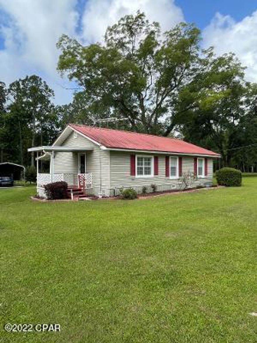Country living at its finest. This quaint 2 bedroom home sits on over 5 acres, has lots of trees, and comes with its own stocked fishpond. The home is sturdy, modern, and ready to move into. 2 bedrooms with 1 full bath. The kitchen is nice size, equipped with modern appliances, and has a breakfast bar dividing the kitchen and dining area. A large laundry room that includes the washer and dryer. Central Heating & Air Conditioning and electric Hot Water Heater. 

The property is absolutely beautiful. Fenced, gated, and cross-fenced, with many shade trees and fruit trees. There are 2 out-building included in the sale. The dirt road into the property is county maintained and in good condition.