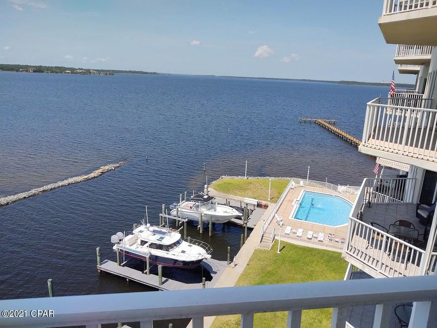 Marina Bay Condo on beautiful North Bay. Just over Baily Bridge in Lynn Haven. You'll appreciate this one owner, three bedroom, three bath unit with a fantastic floorplan, views that never end, and 2,000 sq ft of luxurious space to relax and enjoy. Bedrooms, baths and closets are all well sized along with a large laundry room and ample storage. You can see for miles on your 6th floor balcony and the sunsets are amazing! 

Marina Bay offers many amenities, including an inground pool, hot tub, gym, fishing pier, designated parking space on first floor covered parking deck. This great location is just a walk to Porter Park in Lynn Haven and boat ramp.