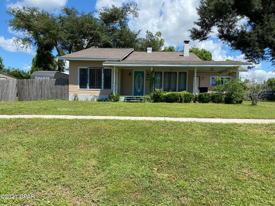 CURRENTLY UNDER CONTRACT SELLER ACCEPTING BACK UP OFFERS. The crown molding and 9 foot ceilings add the charm, the kitchen has decorative cabinets and the vent hood is beautiful. The paved parking lot is a long driveway with a place to park your boat, and many automobiles. Fully privacy fenced back yard with a covered back yard. There are multiple fruit trees. You will find decorative molding throughout the home. Also included is a 12 x 16 storage shed with window and shelf. Wood burning fireplace. New Roof put on in 2019 and new windows in the back of the house.  Stainless appliances. He is being deployed so doesn't have the time to paint like he wanted to so there is a couple of projects that reflects the price.